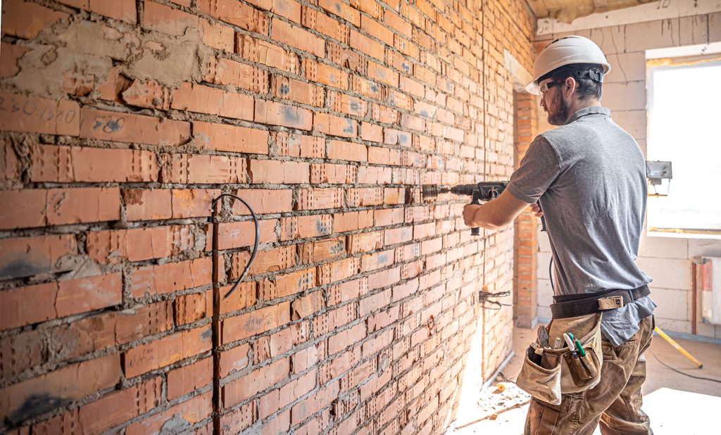 Rowhome Parapet Wall Repair & Structural Masonry Tie-Ins in Philadelphia shown in a realistic Philadelphia, PA residential construction setting.